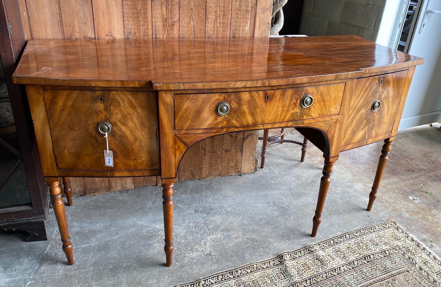 A Regency mahogany bowfront sideboard, length 184cm, depth 75cm, height 93cm